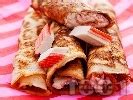 Солени палачинки суфле пълнени с рулца от раци, лимонов сок, къри и ...