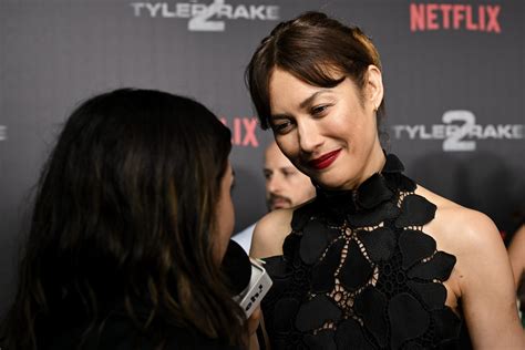 Wardrobe Breakdown: Olga Kurylenko At ‘Extraction 2’ Premiere In Madrid