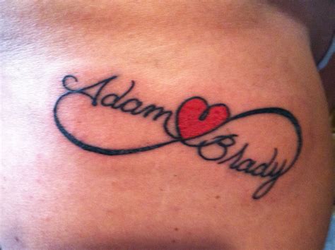 infinity sign with name tattoo 6