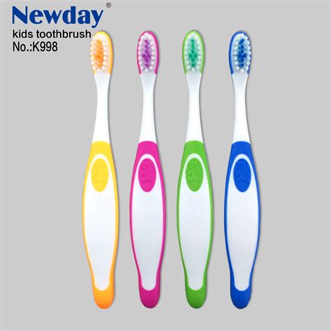 Soft Tapered Bristles Kids Toothbrush With Suction Penguin Shape Handle ...