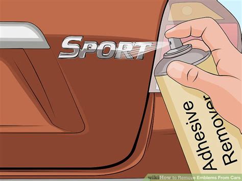 how to remove emblems off a car