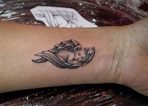 фото тату ангел от 14.11.2017 №008 - tattoo angel - tattoo-photo.ru ...