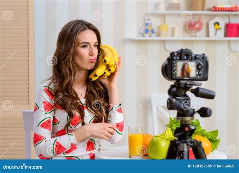 Woman playing with bananas stock image. Image of juice - 128327685