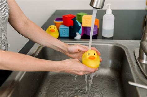 How do you clean plastic toys?