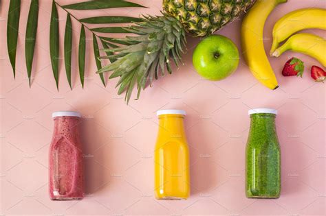 Colorful smoothies in bottles ~ Food & Drink Photos ~ Creative Market