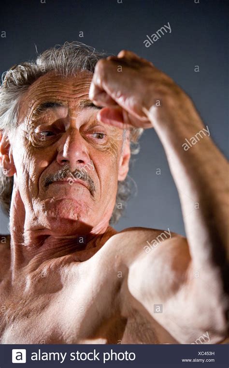 Senior Man Flexing Muscle Stock Photos & Senior Man Flexing Muscle ...