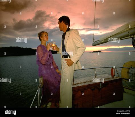 Man having drink on yacht hi-res stock photography and images - Alamy