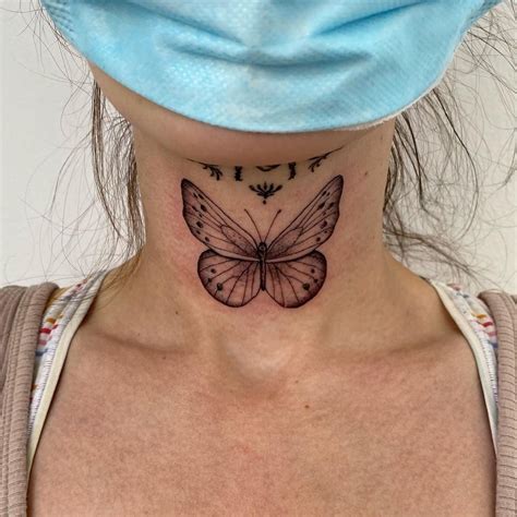 Butterfly on Neck Tattoo Meaning and Butterfly Neck Tattoo Designs ...