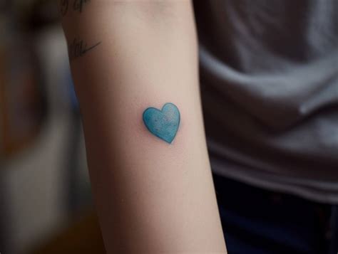 Blue Heart Tattoo Meaning & Symbolism (Passion)