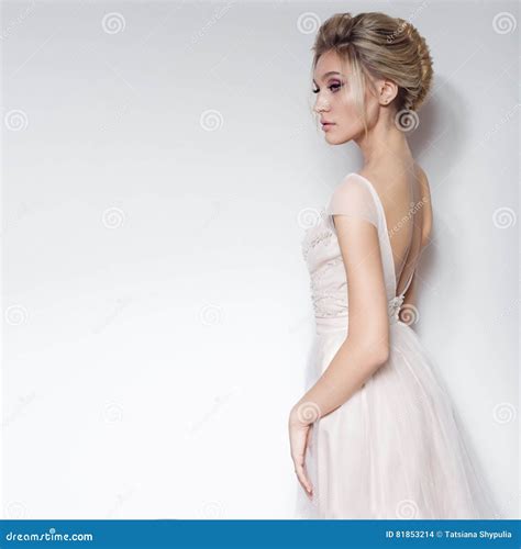 Beautiful Delicate Bride Girl in Soft Pink Skazachno Wedding Dress with