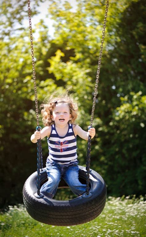 swinging stock photo image  happy beautiful friend