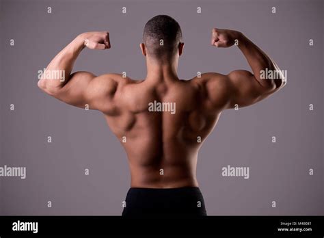 Back Double Biceps Pose Stock Photo - Alamy