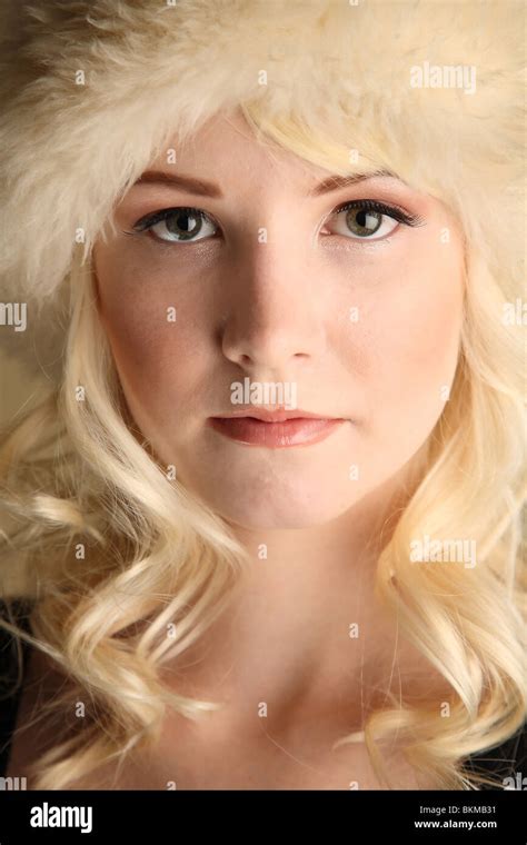 Young woman beauty photo with fuzzy hat Stock Photo - Alamy