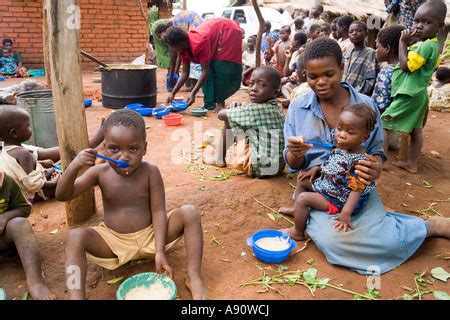 Children eating phala (maize porridge) as part of the Joseph Project ...