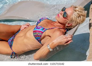 Beautiful Mature Blonde Bikini Model Poses Stock Photo 1131715139