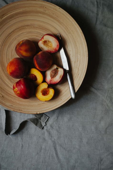 Download Image Delicious Peaches in Their Natural Setting | Wallpapers.com