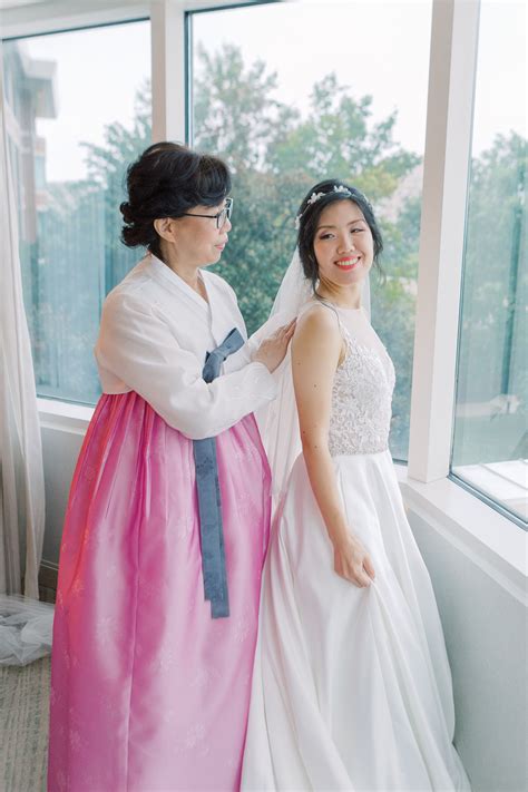 Mother-of-the-Bride in Korean Hanbok Helping Bride Get Ready