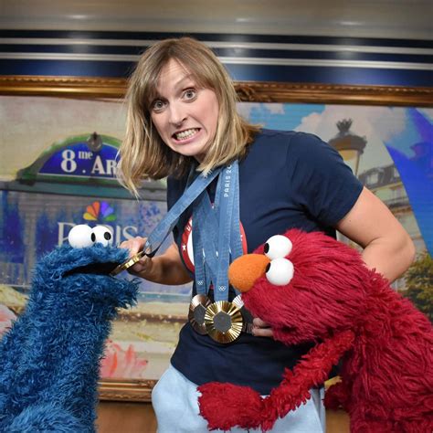 Download Katie Ledeckywith Sesame Street Characters Wallpaper