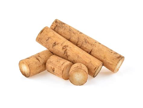 premium photo burdock roots isolated white background