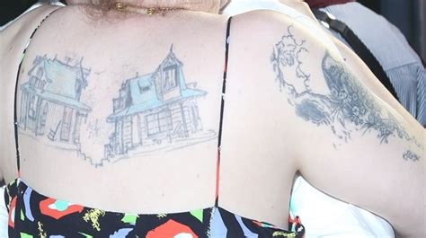 Lena Dunham's Upper Back House Tattoo in Cold-Shoulder Dress