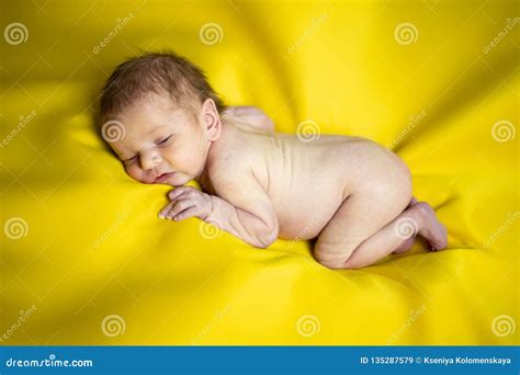 Little Newborn Baby Boy on a Yellow Background Stock Image - Image of ...
