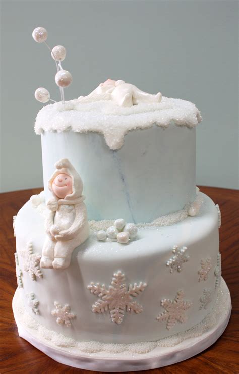 What an adorable cake by Fields of Cake - I love the little snow poeple ...
