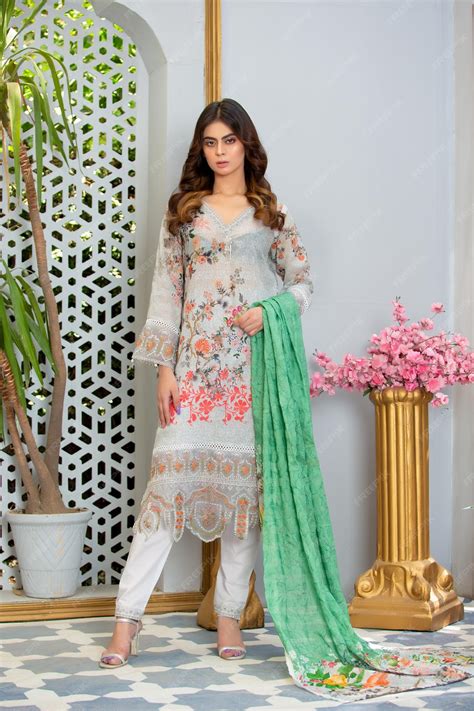 Premium Photo | Hot pakistani girl standing with flowers and plants