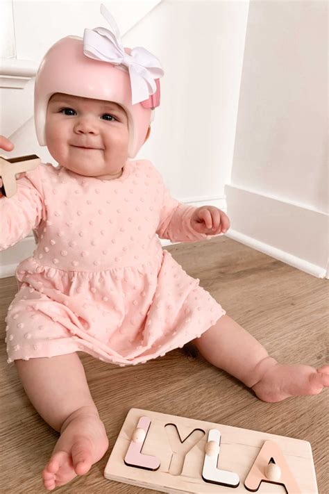Baby Helmet Bow | Baby helmet, Baby girl bows, Baby sling carrier