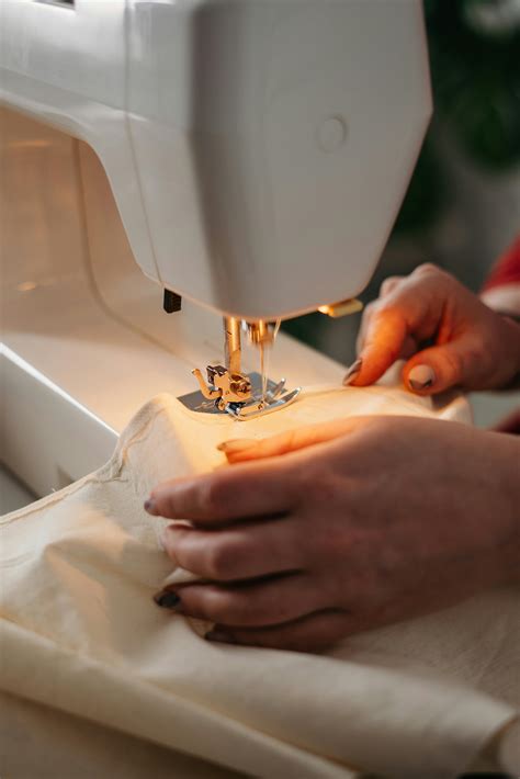 Person Using a Sewing Machine · Free Stock Photo