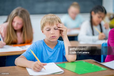 Stressed Out Boy High-Res Stock Photo - Getty Images
