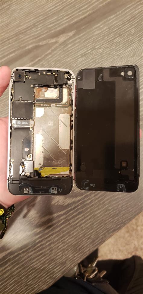 The inside of of my friends old iphone 4 (minus the battery) : r