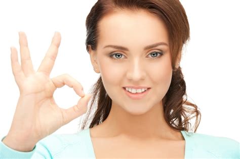 Premium Photo | Bright picture of lovely teenage girl showing ok sign