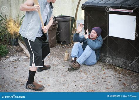 Bully Threatens Homeless Man Stock Photo - Image of helpless, life ...