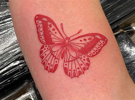 Butterfly tattoo | Red ink tattoos, Red tattoos, Butterfly tattoo