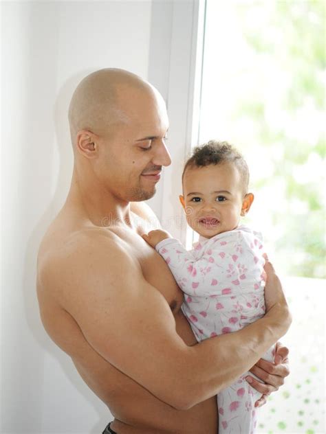 Metis Young Man and His Daughter Stock Image - Image of room, game ...
