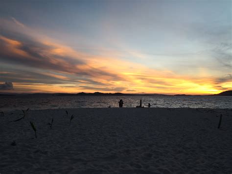 Enjoy the Sunset at Naked Island in Siargao - SiargaoIslandHopping.com