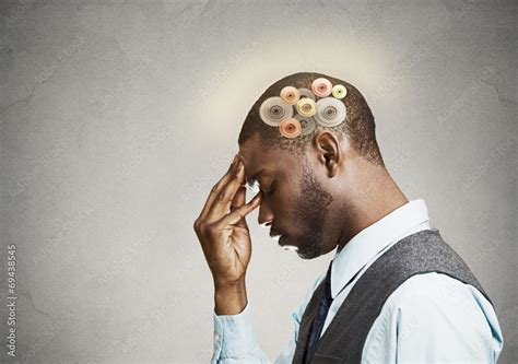 side profile portrait man thinking hard  gear mechanisms stock