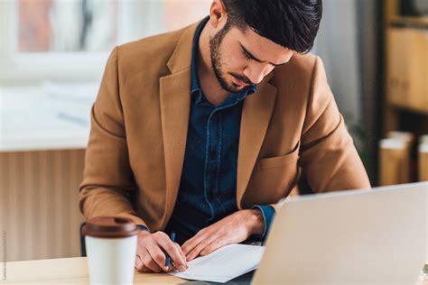 man reading  book  stocksy contributor lumina stocksy