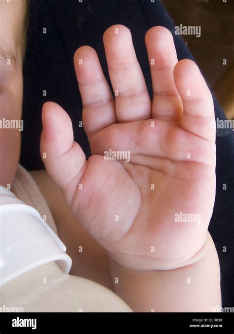 baby boy's left hand Stock Photo - Alamy