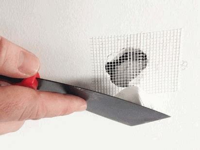 how to fix a hole in the wall with plaster