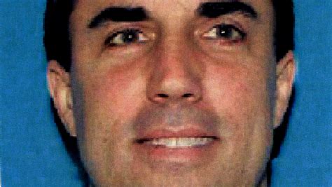 RGJ archives: Darren Mack turns himself in, booked into Washoe jail in 2006