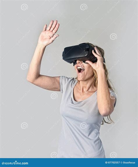 Attractive Blond Woman Wearing Headset VR Virtual Reality Vision
