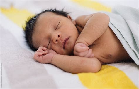 "Sleeping Newborn" by Stocksy Contributor "Diane Durongpisitkul" - Stocksy
