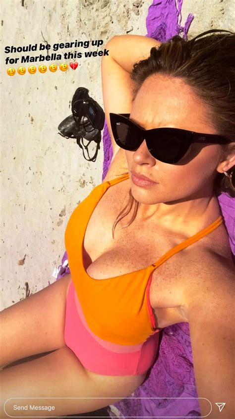 Emily Atack flashes boobs in plunging swimsuit for sizzling exposé