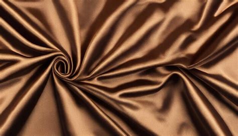 Premium Photo | A brown silk fabric with a spiral pattern.