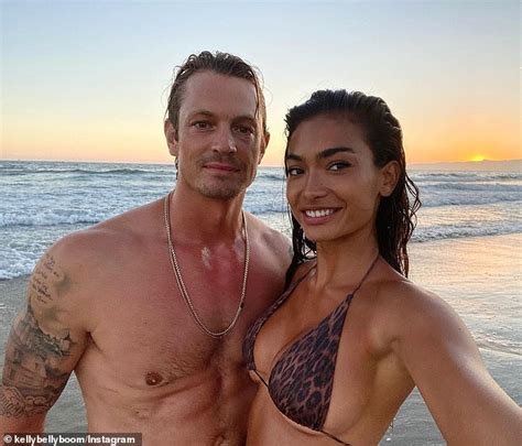 Joel Kinnaman shares a tender kiss with his bikini-clad fiancée Kelly