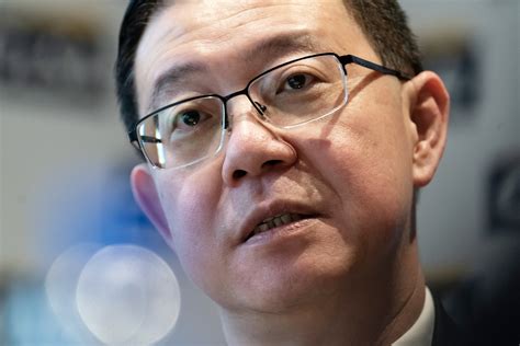 malaysias  finance minister lim charged  bribery bloomberg