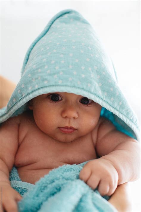 "Mother Drying Off Baby After A Bath." by Stocksy Contributor