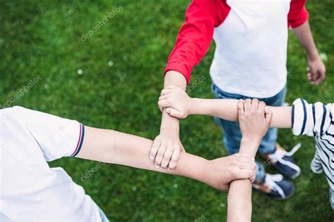 Children holding hands — Stock Photo © alebloshka #159794920