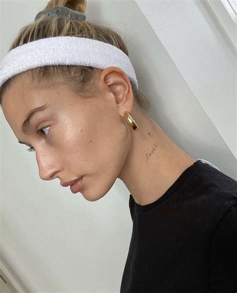 The Meaning Behind Hailey Bieber's Hip Tattoos - carbsincarrots